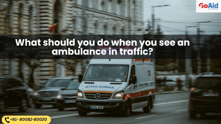 What should you do when you see an ambulance in traffic?